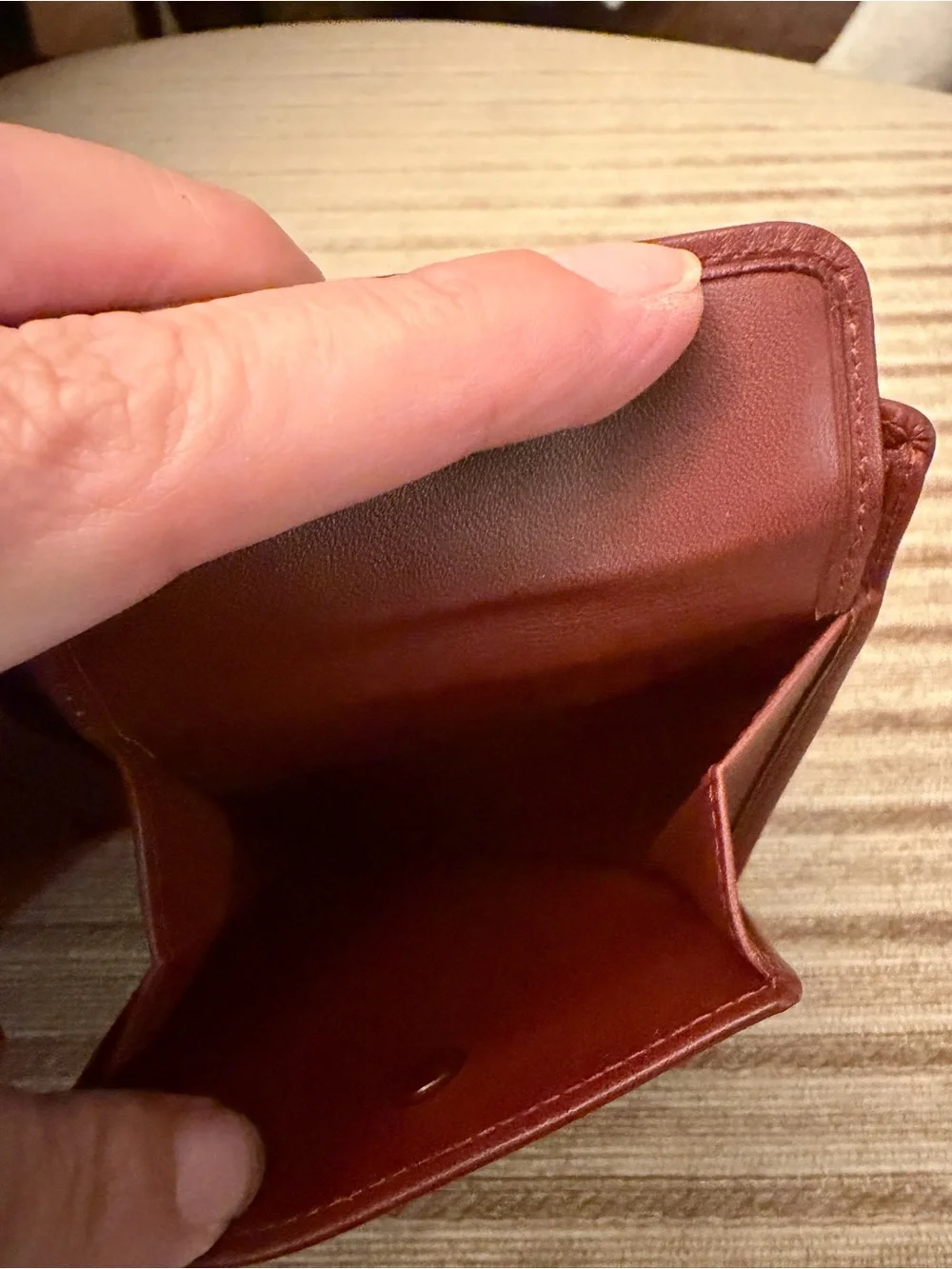 Cartier Burgundy Leather Bifold Wallet with Gold Corner Accents